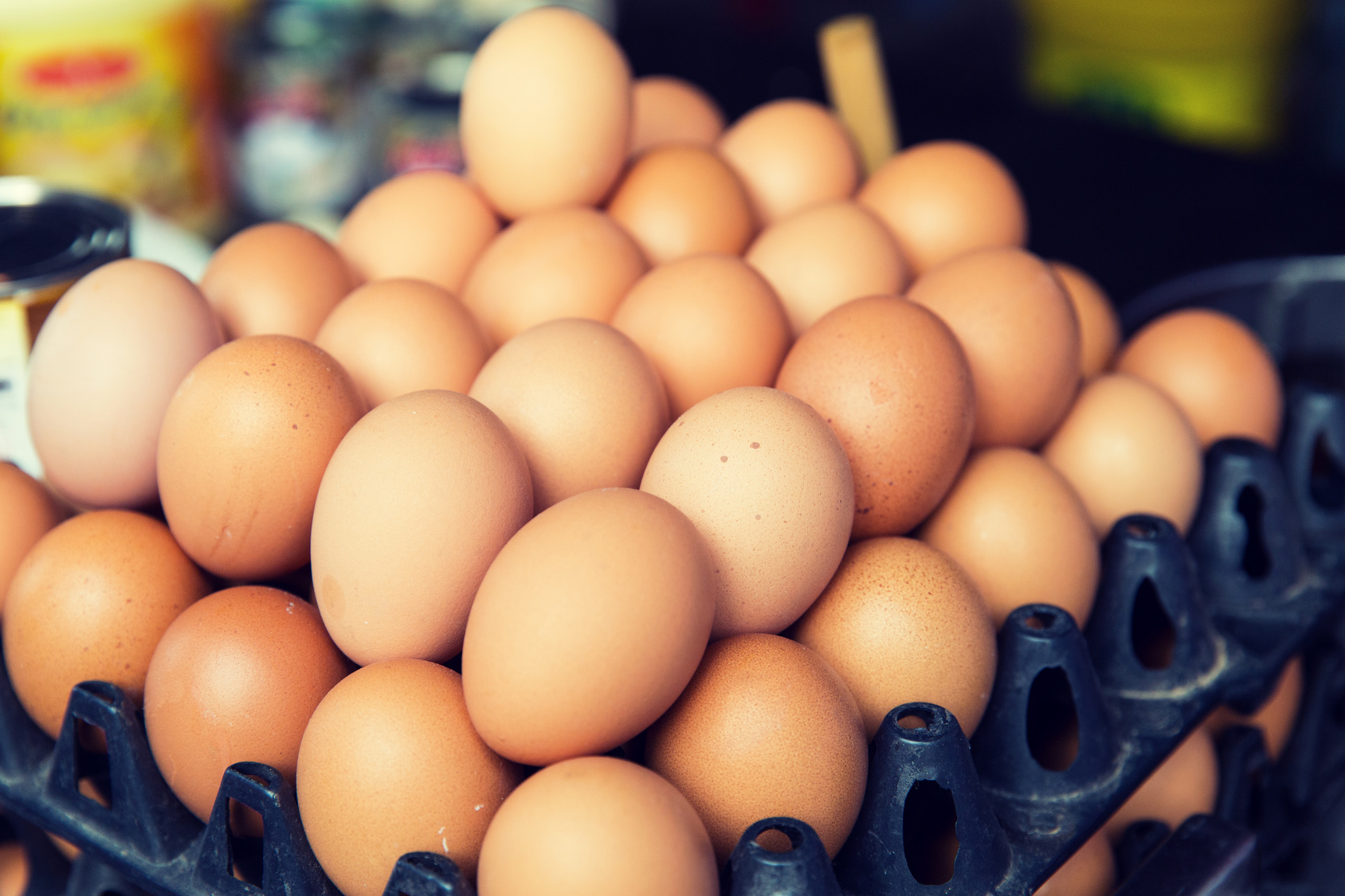 fresh eggs on tray at asian street market