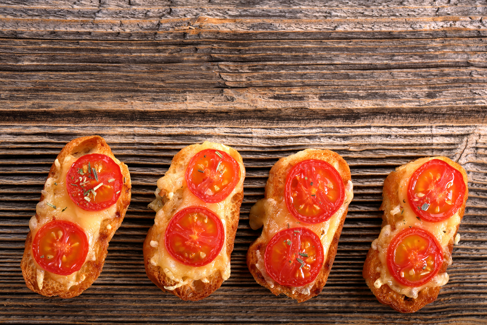 Grilled toast with cheese and tomatoes