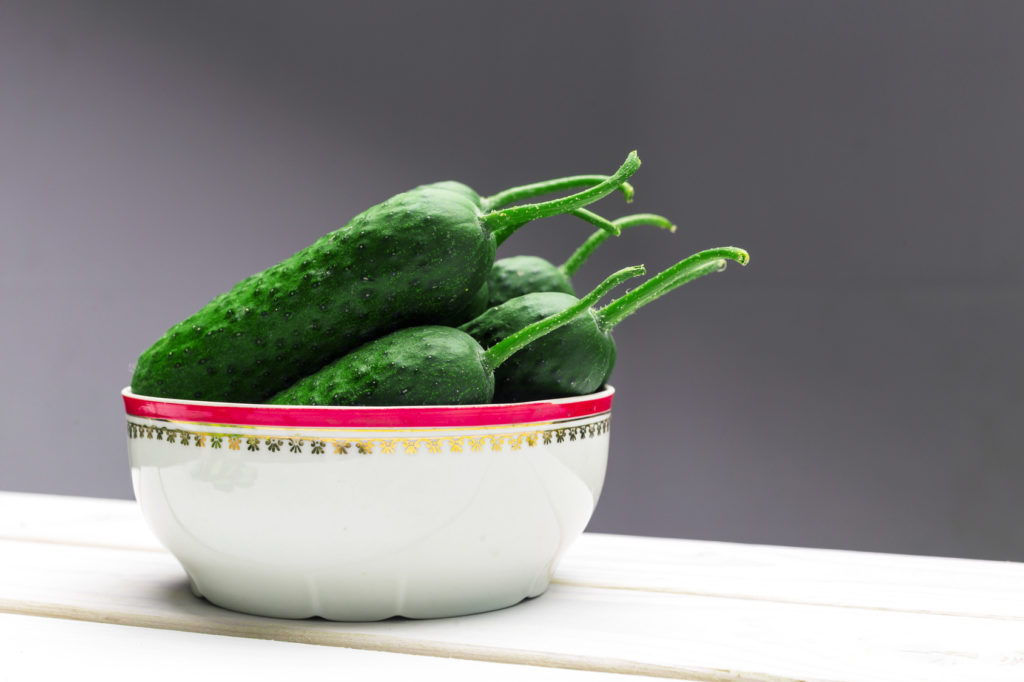 Cucumber on wooden background