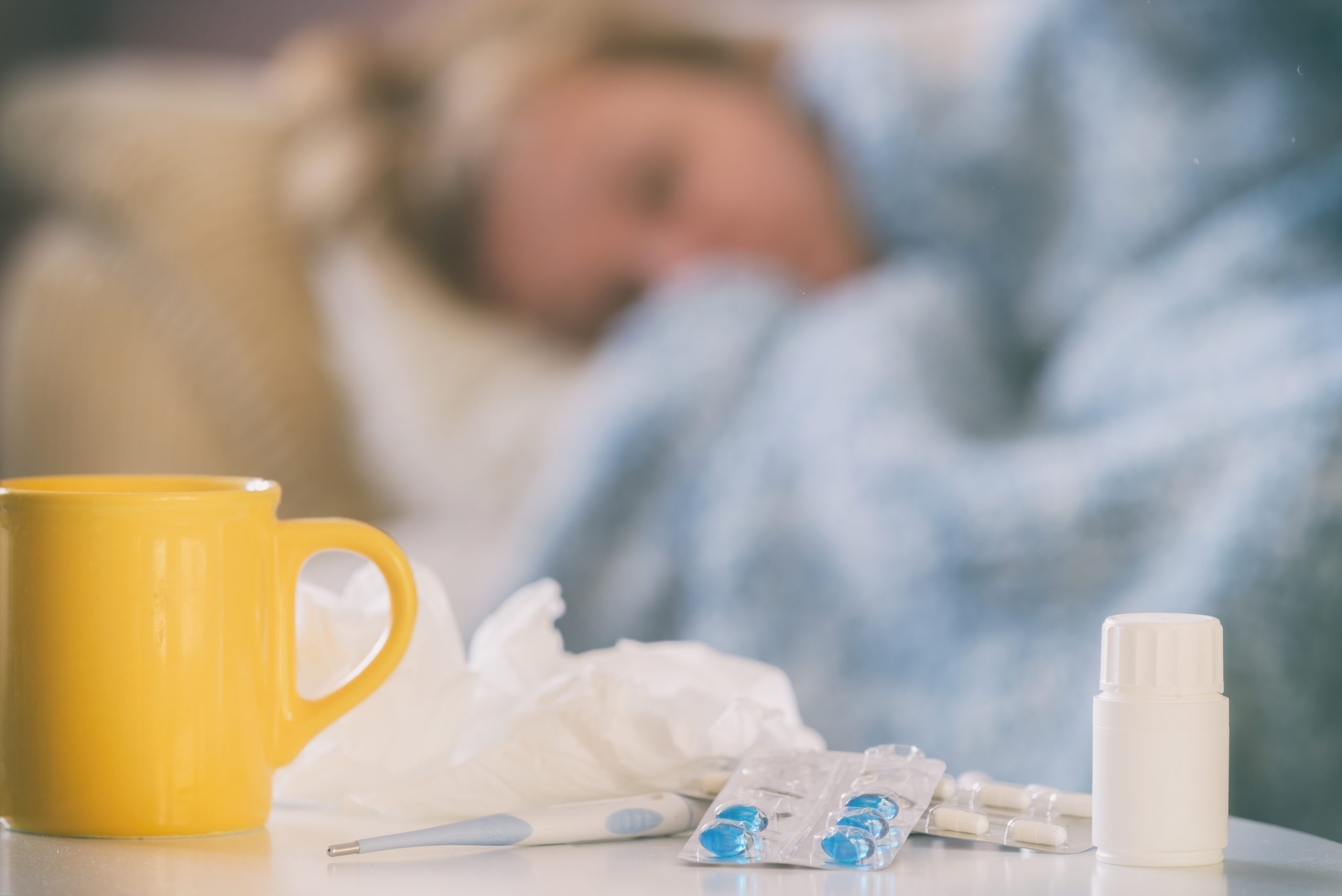 Mature woman suffering from coronavirus, flu or cold