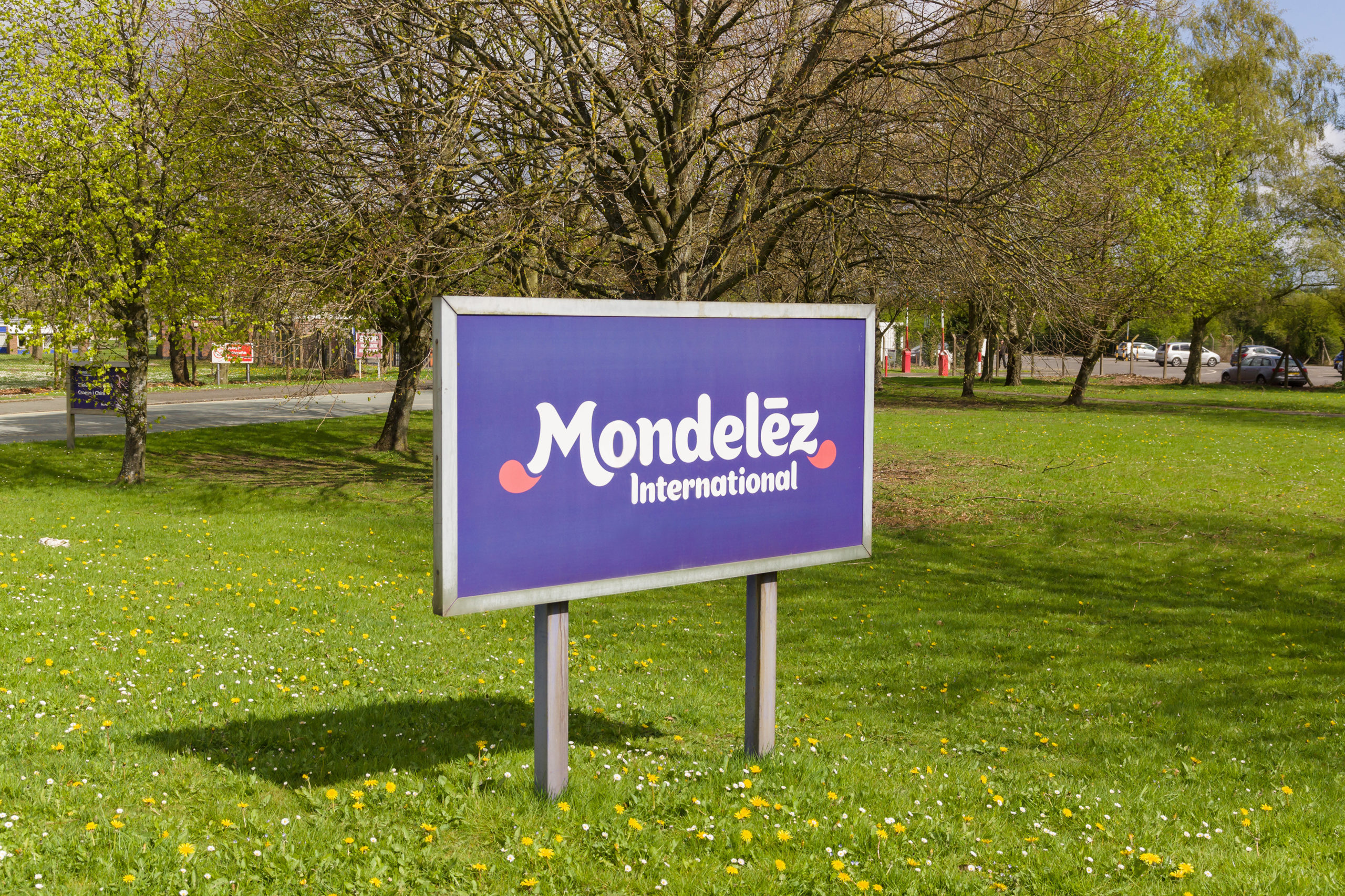 Mondelēz International sign outside the cocoa bean processing factory where chocolate is made in the UK