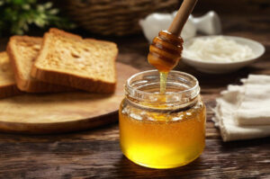 miele api zuccheri IA Depositphotos_804627206_XL