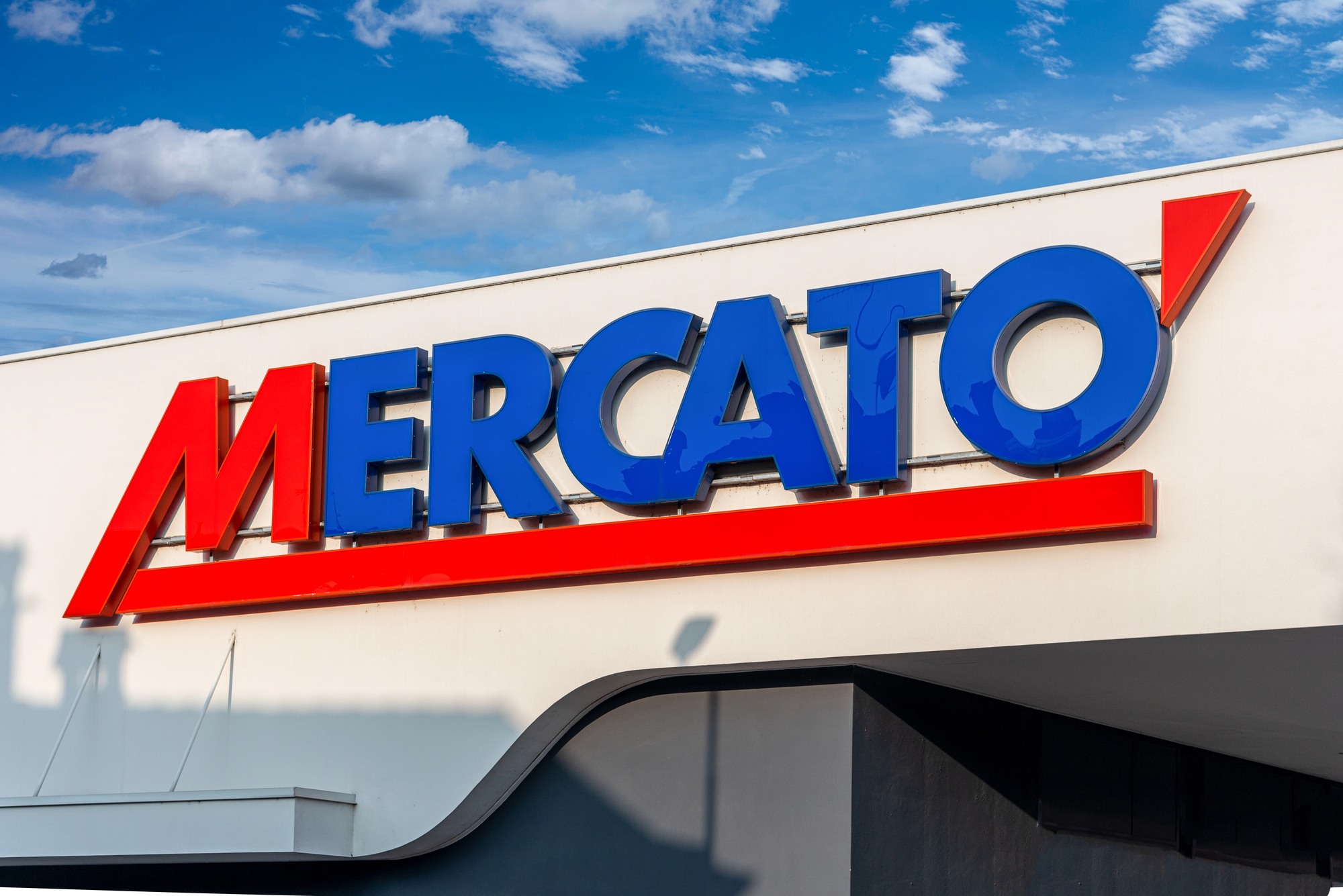 Insegna di un punto vendita Mercatò a Cuneo, concept: supermercato, supermercati